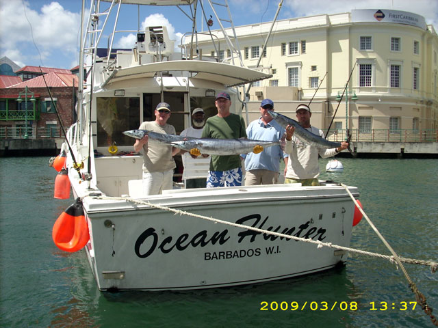 Ocean Hunter charter fishing boat entering Bridgetown Careenage, Barbados with her catch of game fish from barbados coastal waters.